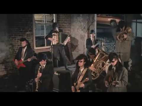 02 - Säkkijärven Polkka - Leningrad Cowboys Go America [***VIDEO CUTE***]