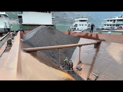 Barges unload large and small pebbles - Relaxing video, cooler weather in the fall