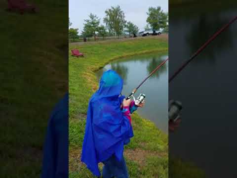 Her second flathead catfish at Zetts catfish farm
