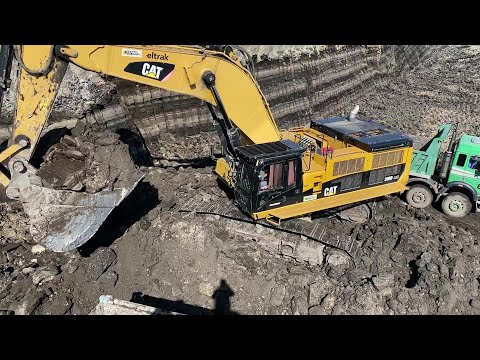 Caterpillar 390D Excavator Loading Mercedes And MAN Trucks - Interkat SA