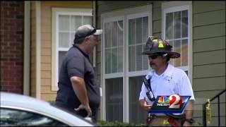 Neighbors hurt when woman attempts suicide