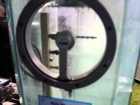 Dimac Tooling Martin Barber explaining the spin window for a clear view into machine tools