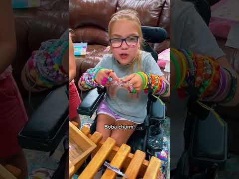 Girl makes bracelets for nonprofit #inclusive #playground #shorts #unboxing @Official_RainbowLoom