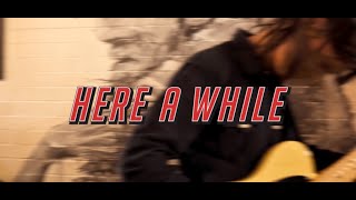 Here a While Music Video