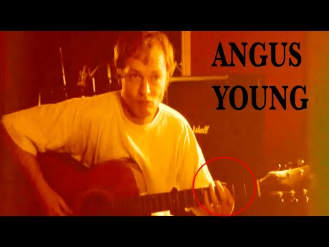 Angus Young (AC/DC) plays acoustic guitar (rare)