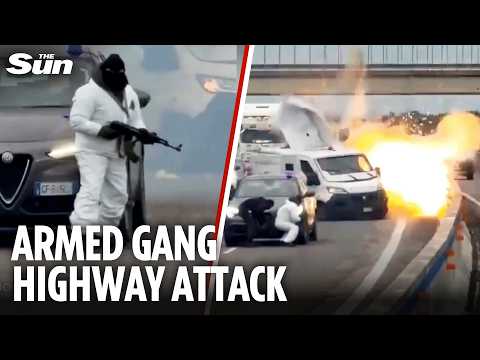 Shocking moment masked robbers fire MACHINE GUNS at armoured CASH-loaded van in broad daylight