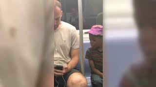 NYC Subway Passenger Lets Adorable Little Boy Play On His Phone