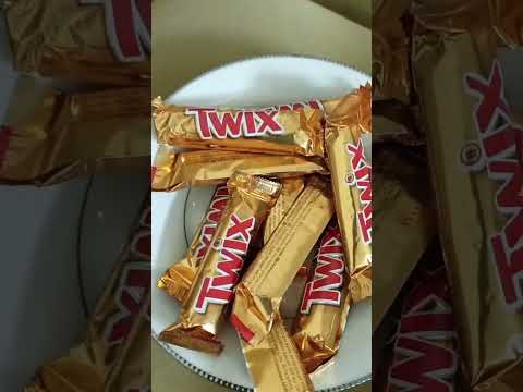 dropping twix minis#yummy #satisfying #shorts