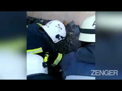 Ukrainian First Responders Save Cat Trapped In Rubble Of Flattened Building
