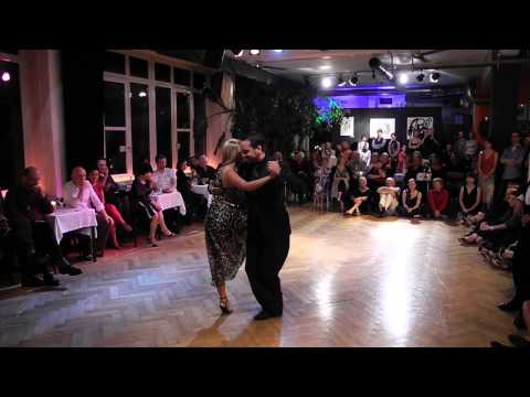  John Erban  and  Clarissa Sanchez  are  dancing  to  a  milonga