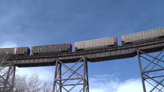 preview picture of video 'BNSF/MRL coal train climbs Mullan Pass and over Austin Creek Trestle'