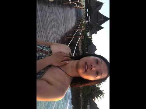 Junjun watching sunset on a jetty in Essque Zalu, Zanzibar