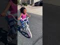 HER FIRST TIME RIDING A BIKE!