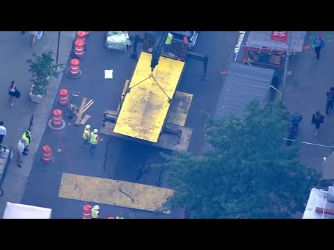 Crews cover street collapse in Greenwich Village with steel plate