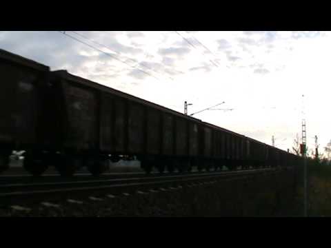 Zwei BR 185 mit Tonerde Zug aus Italien bei Ladenburg