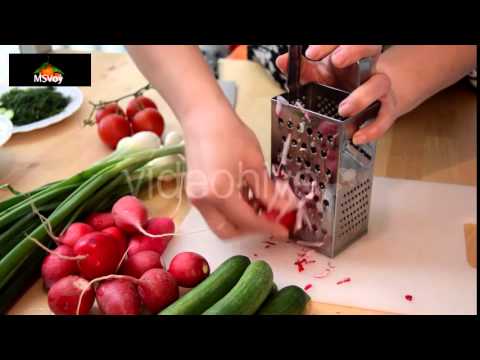 Grating Radish With Metalic Grater | HD Stock Video Footage