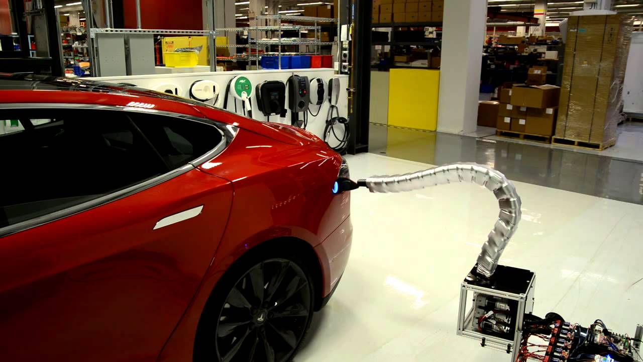 Charger prototype finding its way to Model S - YouTube