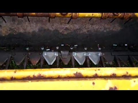 Replacing cutters on the New Holland haybine.
