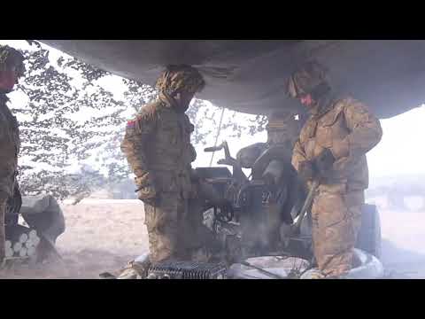 Soldiers from the Royal Horse Artillery Firing the 105mm Light Artillery Gun