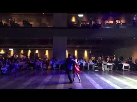  Lily Tan  and  Gennysam Alcantara  are  dancing  to  "  Raza Criolla  "  by  Osvaldo Pugliese  at  Taipei Tango Festival  in  2016