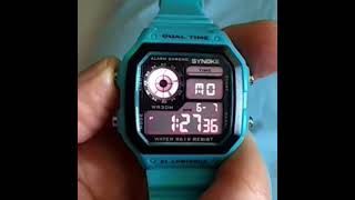 CASIO lookalike: SYNOKE Dual time PARTY TRICK flashy light thing.