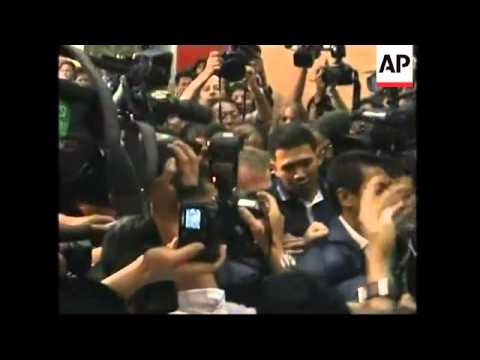 WRAP Suspect in JonBenet case at airport, adds departure lounge shots