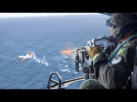 US Helicopter Gunners Trying to Shoot Down Crazy Drone with Heavy Fire