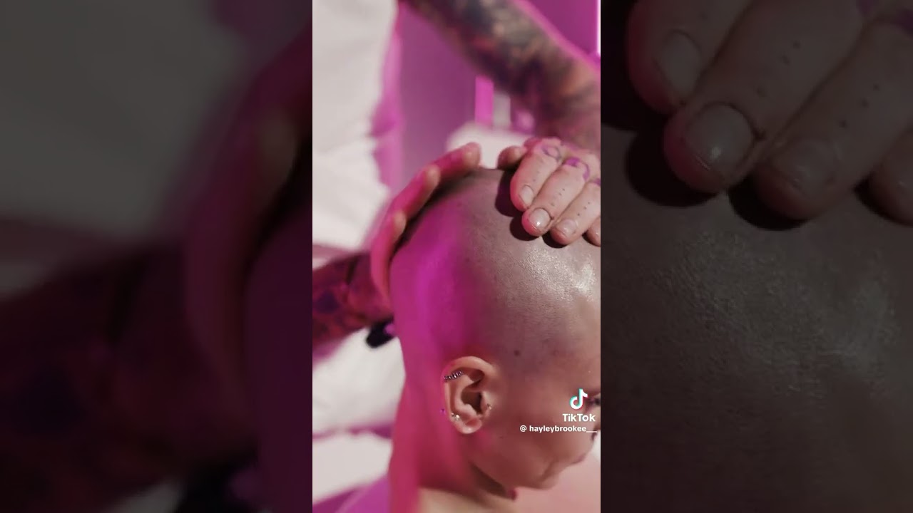 Girl shaves her head and eyebrows