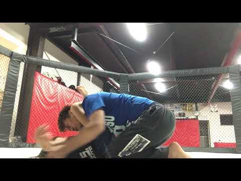 年長の三角締め