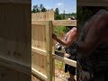 Installing a 6 foot high privacy wood picket fence by Fence Works of Sanford.