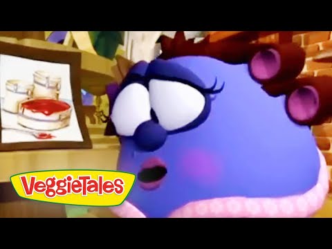 Close-up of a purple VeggieTales character with a surprised expression in a kitchen scene, a framed drawing in the background, VeggieTales logo visible bottom left.