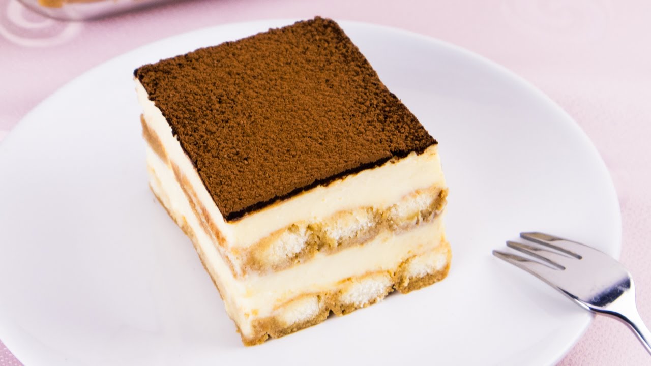 Classic Tiramisu with ladyfingers, mascarpone and cooked eggs! Authentic delicious and simple recipe