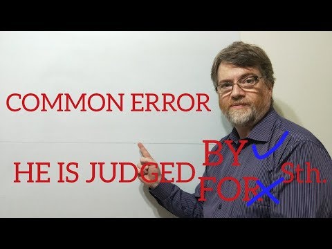 English Tutor Nick P Lesson (366) Judge Someone by Something  Not For or With
