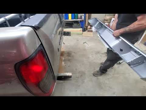 Replacing the rear bumper on a Nissan frontier.