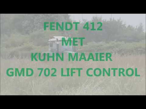 Fendt 412 gras maaien met Kuhn maaier