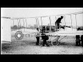 Henri Farman's flying machine in flight over France HD Stock Footage