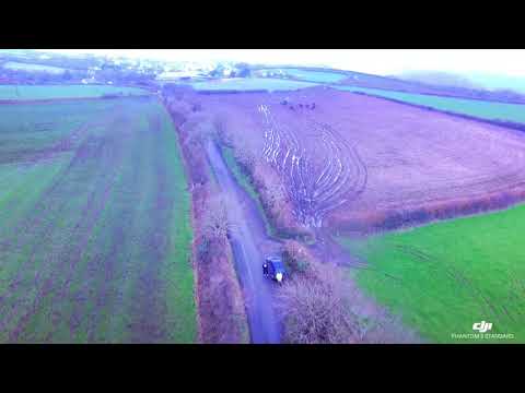 Above Minster church, Boscastle in the snow with the drone