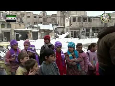 توزيع قبعات صوف على أطفال حي القابون في دمشق من قبل اللواء الأول