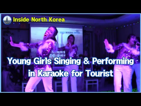 Inside North Korea: Young Girls Singing & Performing in Karaoke for Tourist. Pyongyang.