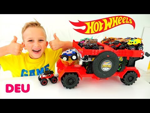 Vlad und Nikita spielen mit Monstertrucks von Hot Wheels