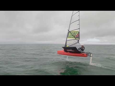 Waszp_X 6.9 foiling in 7 knots of breeze with 12 year old Callum