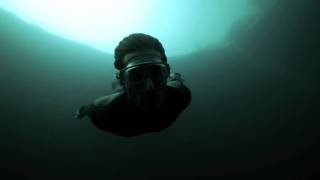 Guillaume Nery base jumping at Dean&#39;s Blue Hole, filmed on breath hold by Julie Gautier