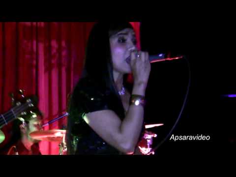 Un Sophal is singing  a classic Bosa Nova song  at Golden Villa Restaurant