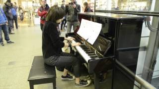 playing Candle in the wind in St. Pancras Station, London on Elton Johns piano