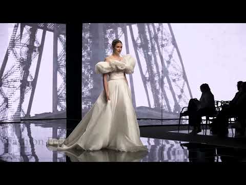 Model TRIPS TWICE during Michela Ferriero Bridal Spring 2024 Fashion Show