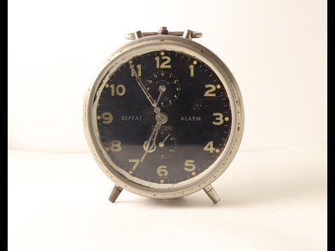 Despertador vintage Peter Repeat alemão pequeno despertador prateado raro