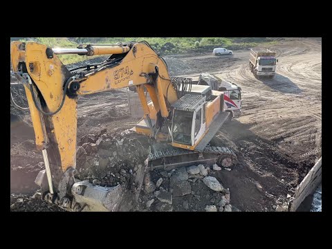 Liebherr 974 Excavator Loading Mercedes & MAN Trucks - Ascon ltd