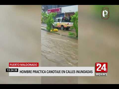 Puerto Maldonado: hombre practica canotaje en calles inundadas