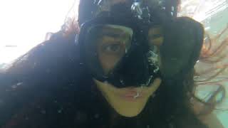 Girl Scuba black mask selfie underwater close up
