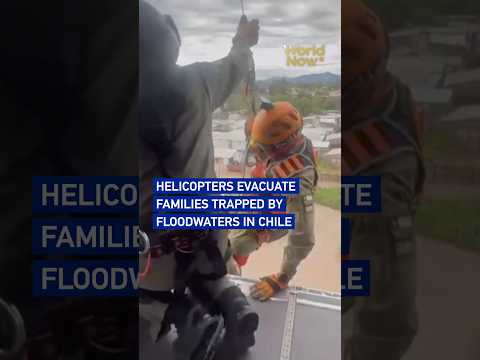 Helicopters evacuate families trapped by floodwaters in Chile